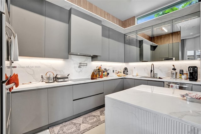 2670 Cypress Ln, Weston, FL 33332 - kitchen featuring gray cabinetry, tasteful backsplash, modern cabinets, and a sink