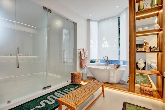 2670 Cypress Ln, Weston, FL 33332 - full bathroom featuring a freestanding bath and a shower stall