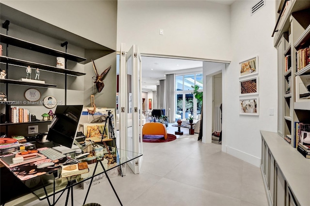 2670 Cypress Ln, Weston, FL 33332 - home office with baseboards, french doors, visible vents, and a high ceiling
