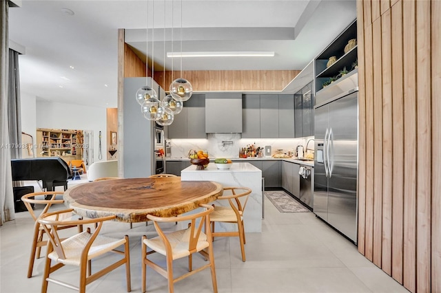 2670 Cypress Ln, Weston, FL 33332 - kitchen featuring a healthy amount of sunlight, light countertops, modern cabinets, and gray cabinetry
