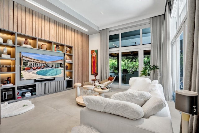 2670 Cypress Ln, Weston, FL 33332 - interior space with wooden walls and concrete flooring