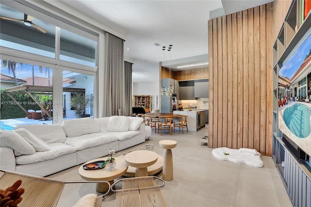 2670 Cypress Ln, Weston, FL 33332 - living room featuring wood walls