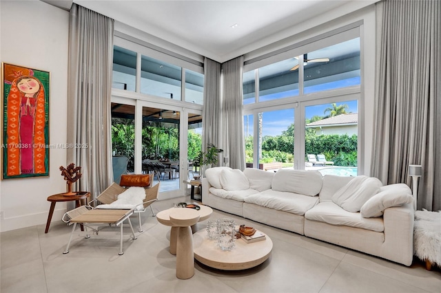 2670 Cypress Ln, Weston, FL 33332 - living room featuring baseboards and a towering ceiling