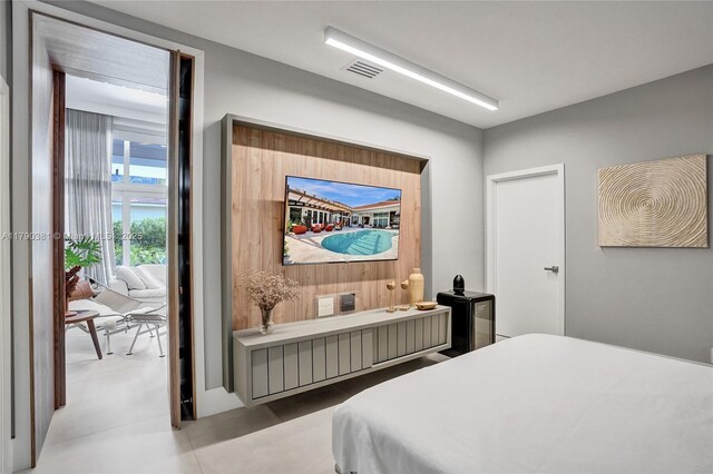 2670 Cypress Ln, Weston, FL 33332 - bedroom with visible vents and concrete floors
