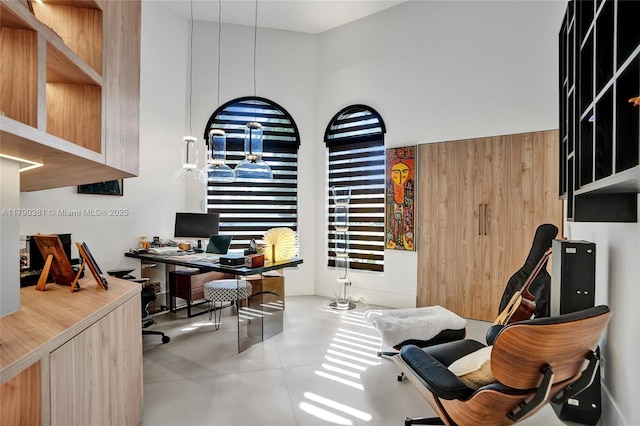 2670 Cypress Ln, Weston, FL 33332 - home office featuring concrete floors and a high ceiling