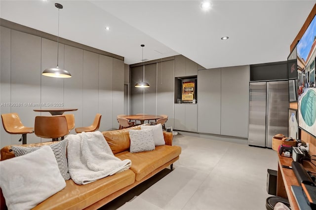 2670 Cypress Ln, Weston, FL 33332 - living area with finished concrete floors, a decorative wall, elevator, and recessed lighting