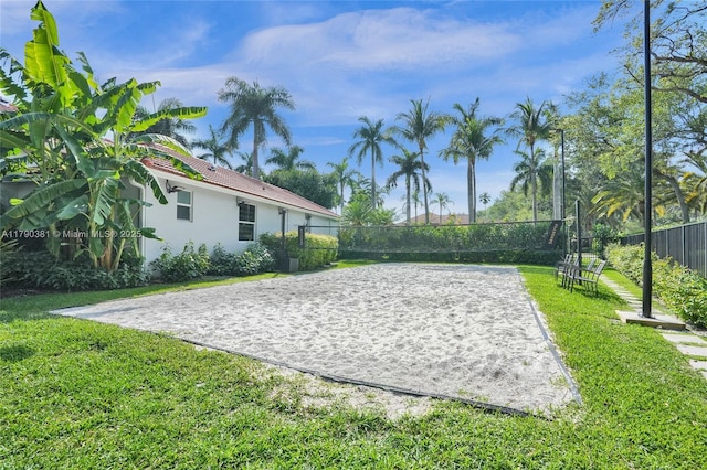 2670 Cypress Ln, Weston, FL 33332 - surrounding community with a yard, fence, and volleyball court