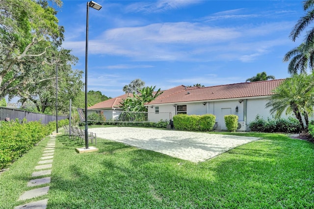 2670 Cypress Ln, Weston, FL 33332 - exterior space with volleyball court and fence