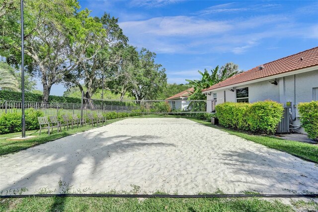 2670 Cypress Ln, Weston, FL 33332 - view of yard featuring fence and volleyball court