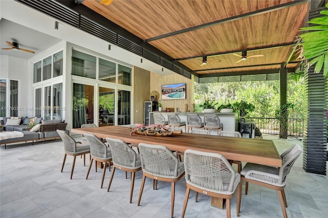 2670 Cypress Ln, Weston, FL 33332 - view of patio / terrace featuring outdoor dining space, fence, ceiling fan, and an outdoor living space