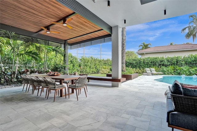 2670 Cypress Ln, Weston, FL 33332 - view of patio featuring ceiling fan, a fenced in pool, and outdoor dining space