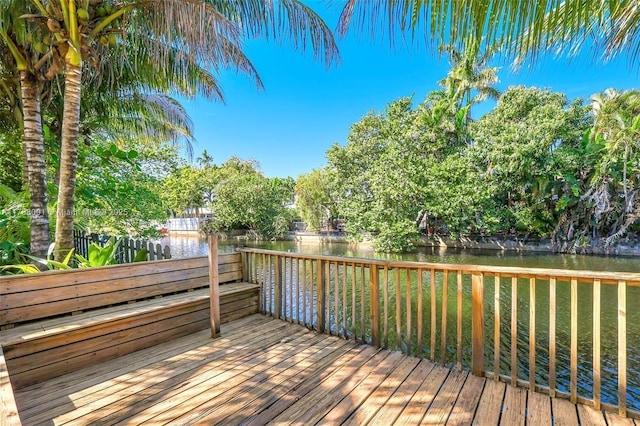8440 NE 1st Ave, Miami, FL 33138 - wooden terrace with fence and a water view