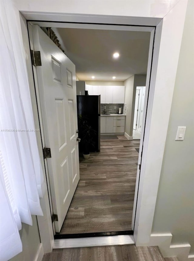 15618 SE US Highway 301, Hawthorne, FL 32640 - hallway with dark wood-style flooring, recessed lighting, and baseboards