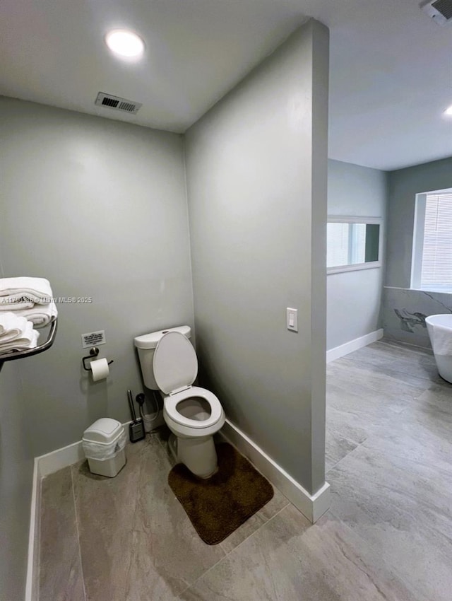 15618 SE US Highway 301, Hawthorne, FL 32640 - bathroom with toilet and baseboards