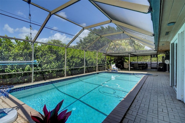 pool with a patio area