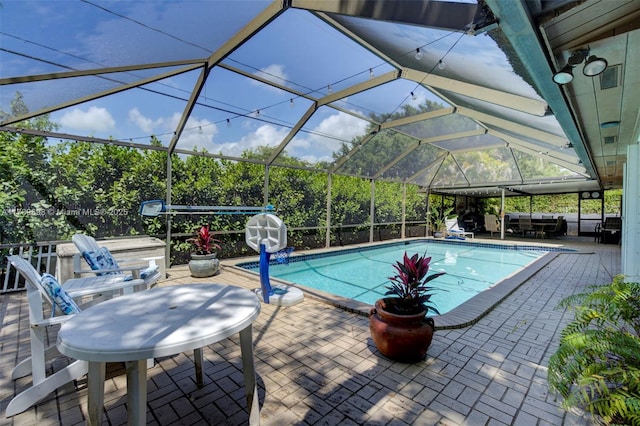 pool featuring a lanai and a patio