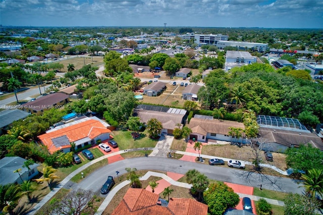 birds eye view of property with a residential view