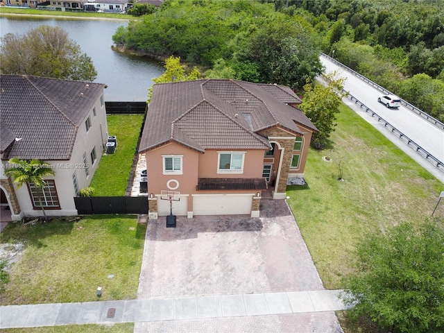 birds eye view of property featuring a water view