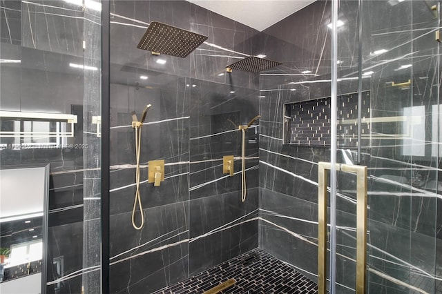 bathroom with a shower stall