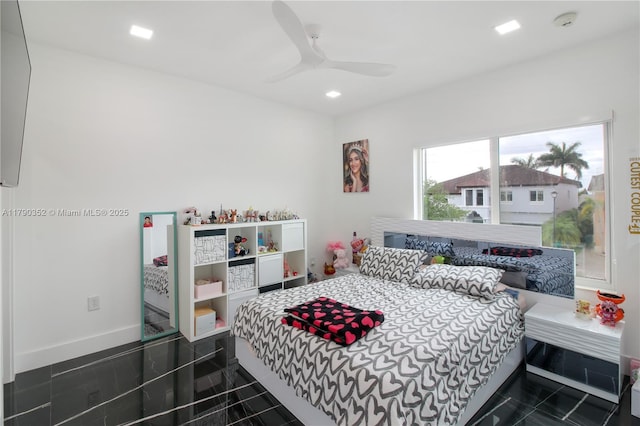 bedroom with ceiling fan, baseboards, and recessed lighting