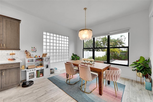8650 NW 39th Ct, Coral Springs, FL 33065 - dining room with light wood-type flooring
