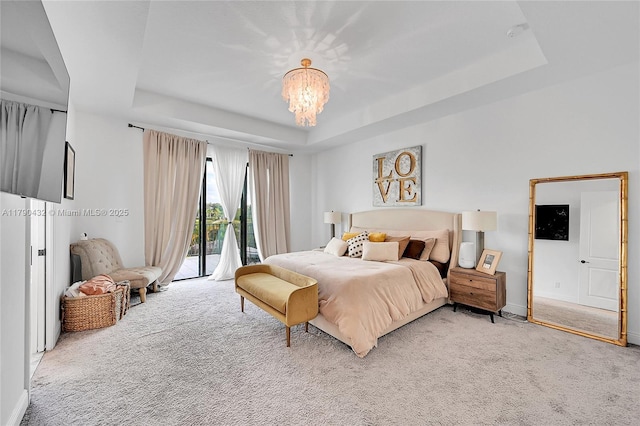 8650 NW 39th Ct, Coral Springs, FL 33065 - bedroom featuring access to outside, a chandelier, light carpet, and a raised ceiling