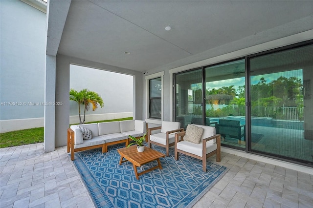 8650 NW 39th Ct, Coral Springs, FL 33065 - view of patio featuring an outdoor living space