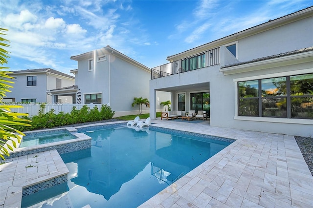 8650 NW 39th Ct, Coral Springs, FL 33065 - exterior space with an outdoor living space, fence, a pool with connected hot tub, and a patio