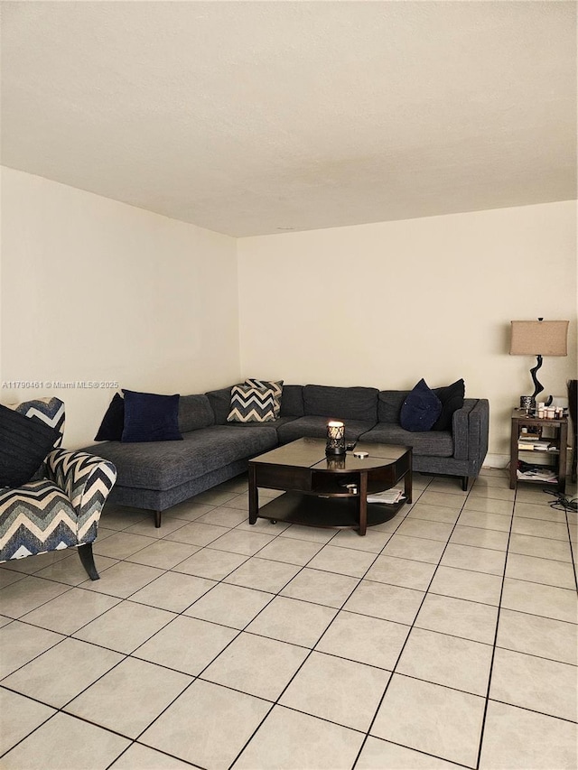 living room with light tile patterned floors