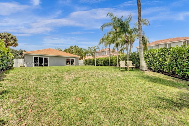 view of yard with fence