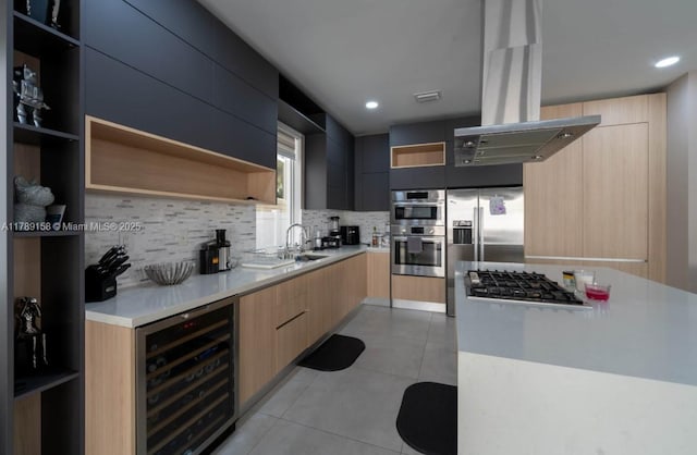 kitchen with modern cabinets, open shelves, appliances with stainless steel finishes, and beverage cooler