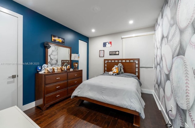bedroom with baseboards, dark wood-style flooring, and recessed lighting