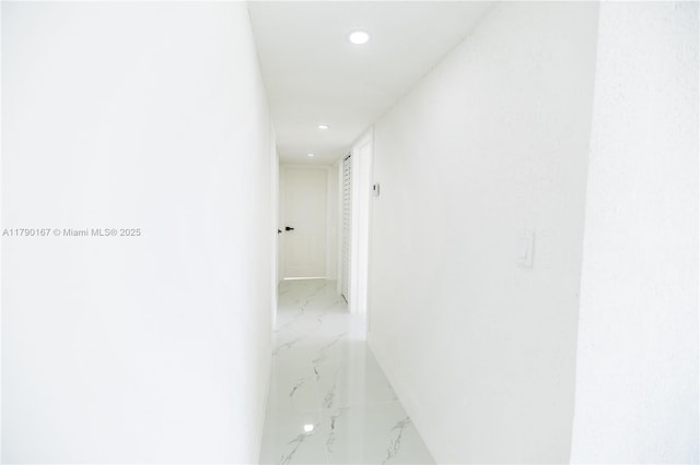 1625 NW 9th Ct, Homestead, FL 33030 - hallway with light marble finish flooring, recessed lighting, and baseboards