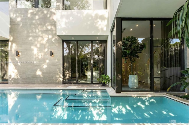 view of swimming pool with a swimming pool