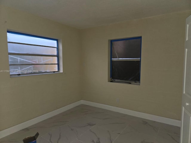 6308 Cleveland St, Hollywood, FL 33024 - spare room featuring marble finish floor and baseboards