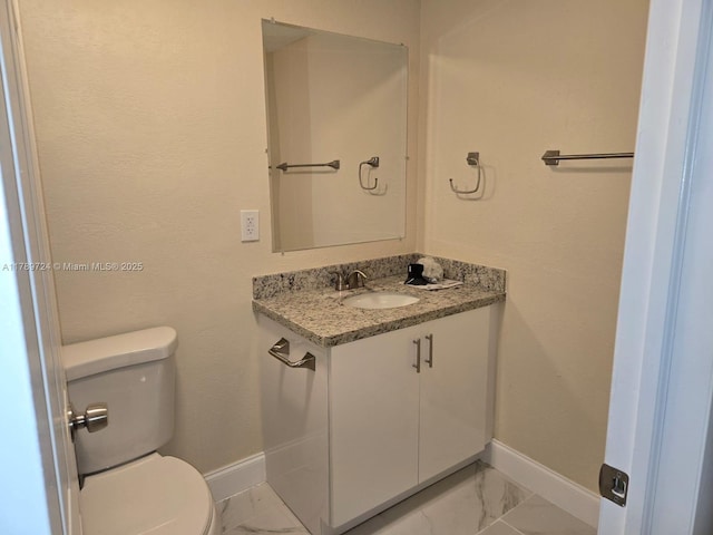 6308 Cleveland St, Hollywood, FL 33024 - half bath featuring marble finish floor, baseboards, toilet, and vanity