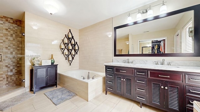 982 NW 133rd Ct, Miami, FL 33182 - full bath with double vanity, a bath, tile patterned flooring, a stall shower, and a spacious closet