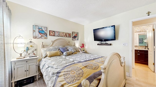 bedroom featuring a textured ceiling