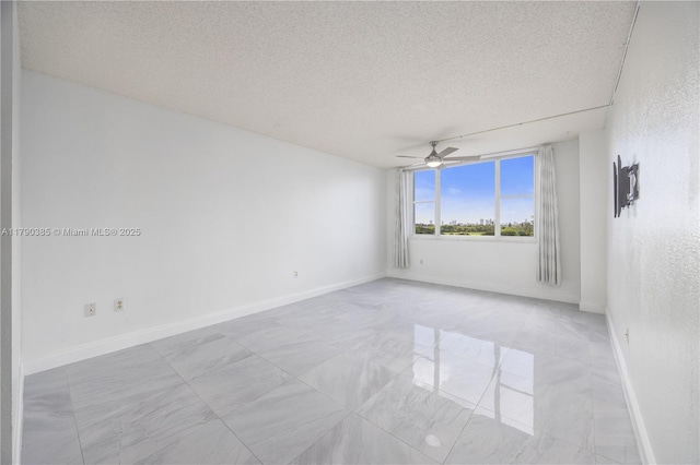 4001 Hillcrest Dr Unit 601, Hollywood, FL 33021 - spare room with ceiling fan and a textured ceiling