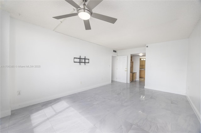 4001 Hillcrest Dr Unit 601, Hollywood, FL 33021 - spare room with marble look tile flooring and ceiling fan