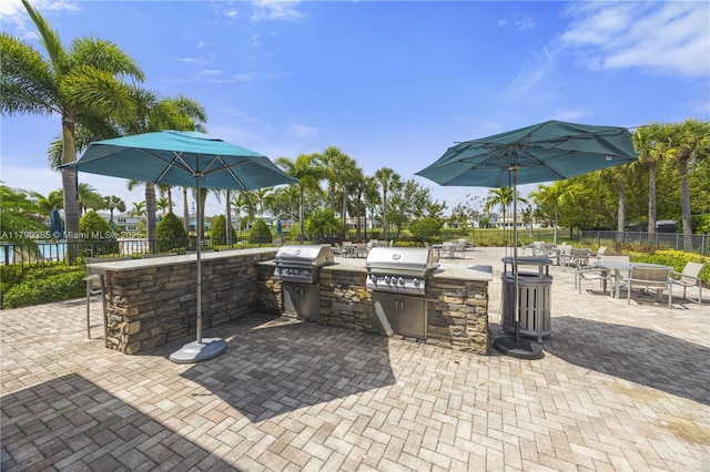 4001 Hillcrest Dr Unit 601, Hollywood, FL 33021 - view of patio with an outdoor kitchen