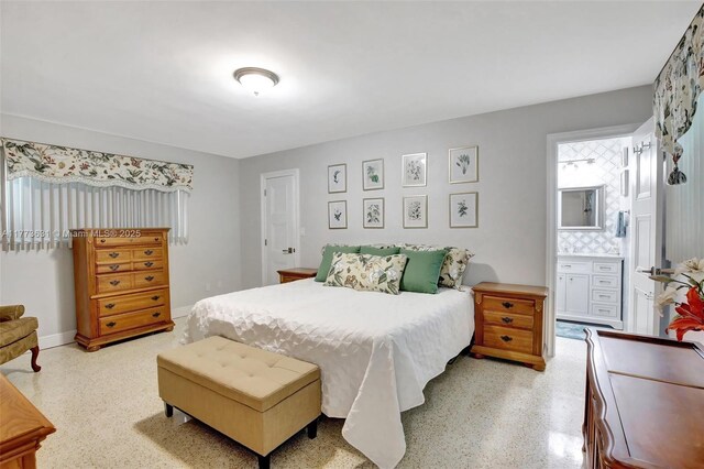 9460 NW 3rd St, Pembroke Pines, FL 33024 - bedroom featuring speckle patterned floor and ensuite bathroom