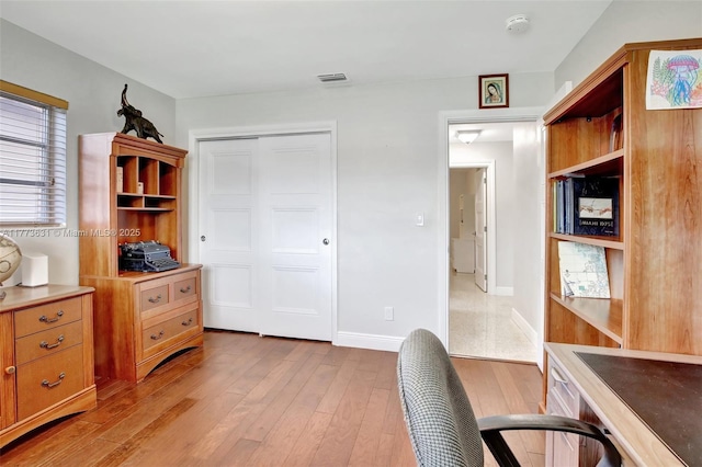 9460 NW 3rd St, Pembroke Pines, FL 33024 - home office with light wood-style floors and baseboards