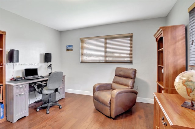 9460 NW 3rd St, Pembroke Pines, FL 33024 - home office with baseboards and wood finished floors