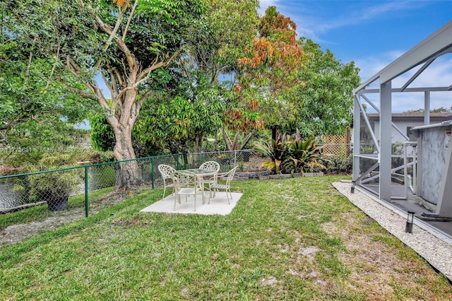 9460 NW 3rd St, Pembroke Pines, FL 33024 - view of yard featuring a patio and glass enclosure