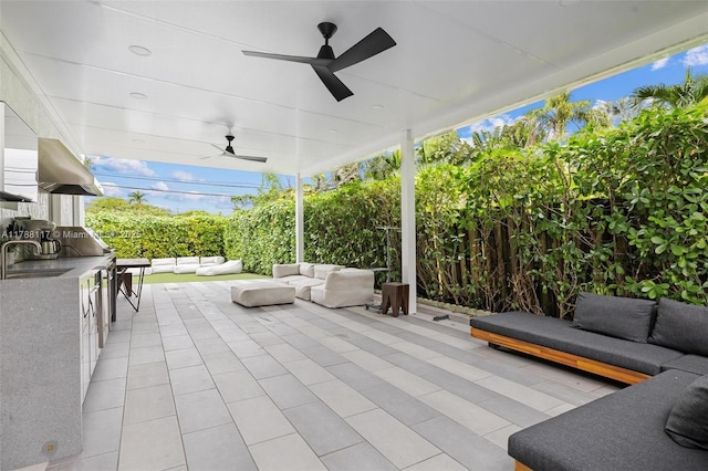 2615 NE 213th St, Miami, FL 33180 - view of patio / terrace featuring exterior kitchen, a ceiling fan, and an outdoor hangout area