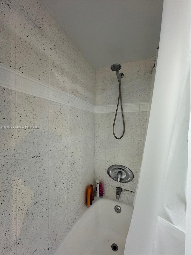 full bathroom with shower / bath combination