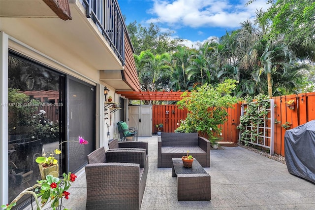 9153 SW 23rd St Unit D, Davie, FL 33324 - view of patio with a fenced backyard and outdoor lounge area