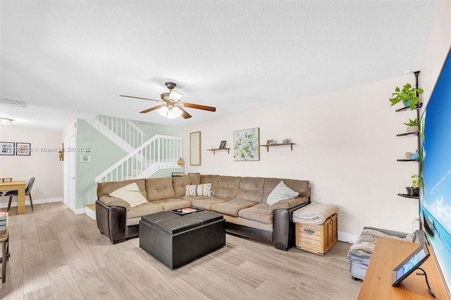 9153 SW 23rd St Unit D, Davie, FL 33324 - living room featuring baseboards, stairway, ceiling fan, and wood finished floors