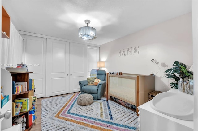 9153 SW 23rd St Unit D, Davie, FL 33324 - bedroom with wood finished floors and a closet